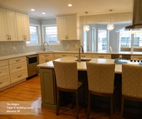 White and gray painted Shaker style kitchen cabinets