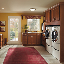 Functional use cabinets in a laundry room area