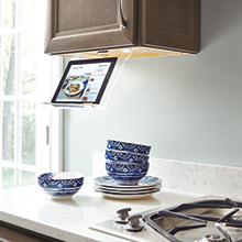 Kitchen cabinet with a tablet holder