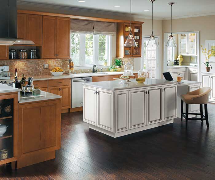 maple wood cabinets with white kitchen island - homecrest