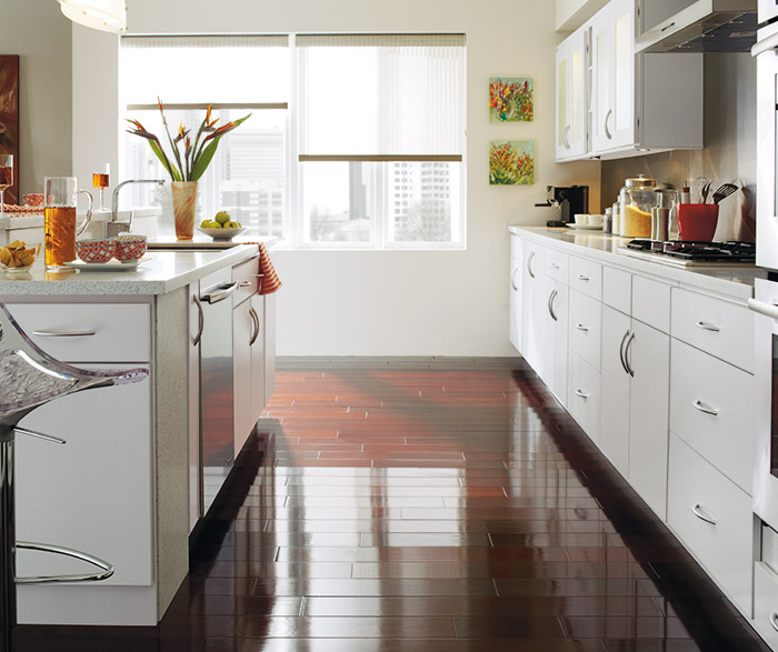 White Rainier slab kitchen cabinets in Alpine opaque finish