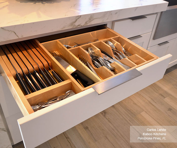 Close up of cabinet drawer organization in white Dover cabinets