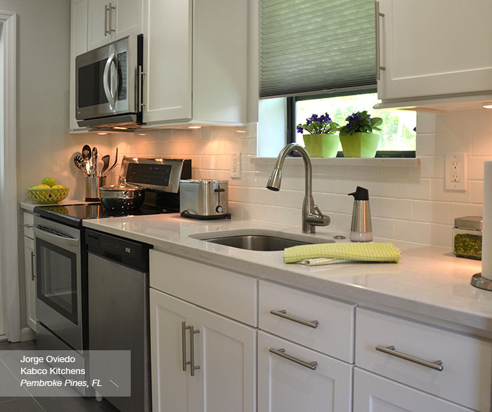white sedona shaker style cabinets in a galley kitchen